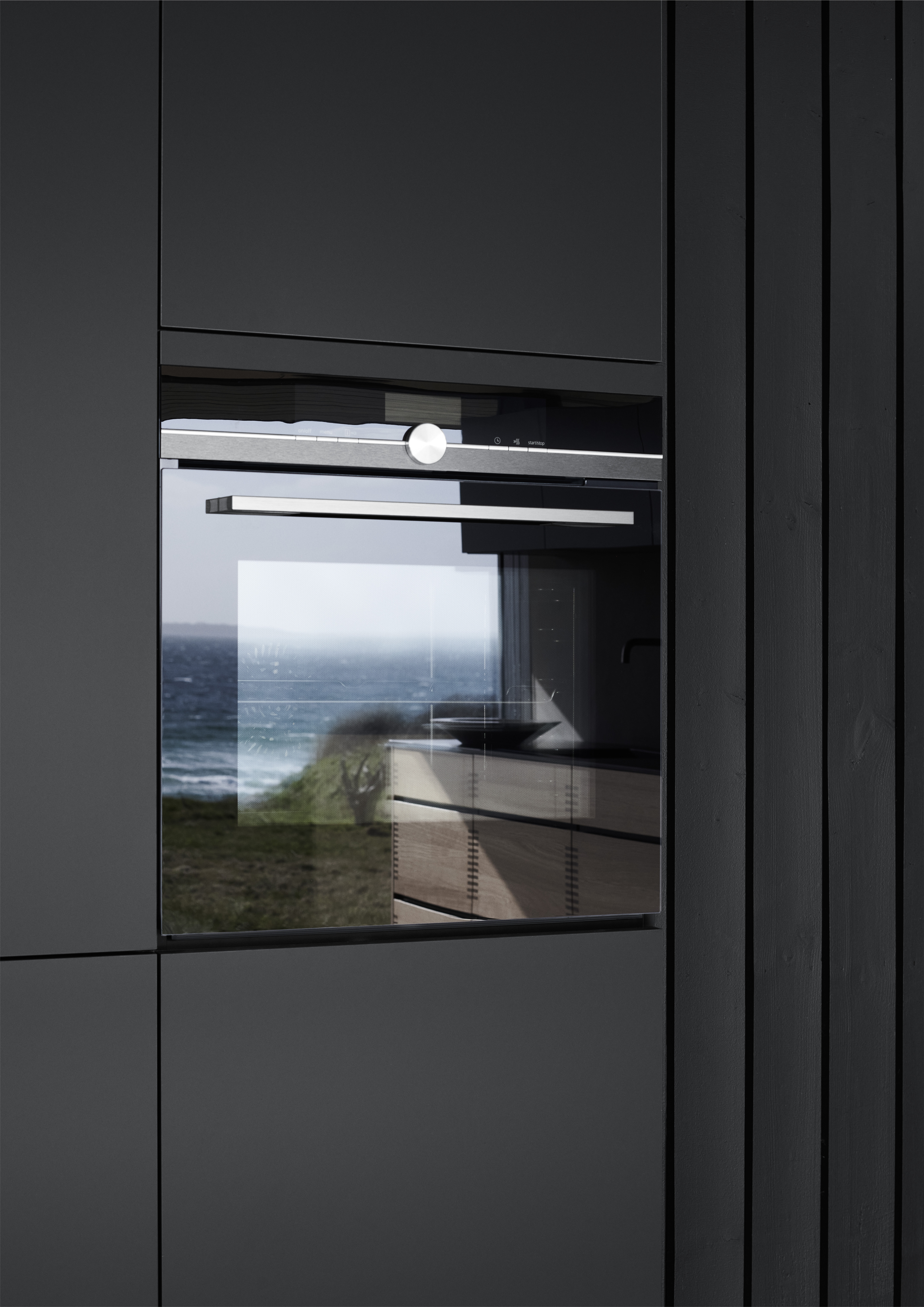 OAKWOOD wood kitchen cabinet with sleek, modern design featuring a reflective glass panel, integrating style and functionality in muted tones.