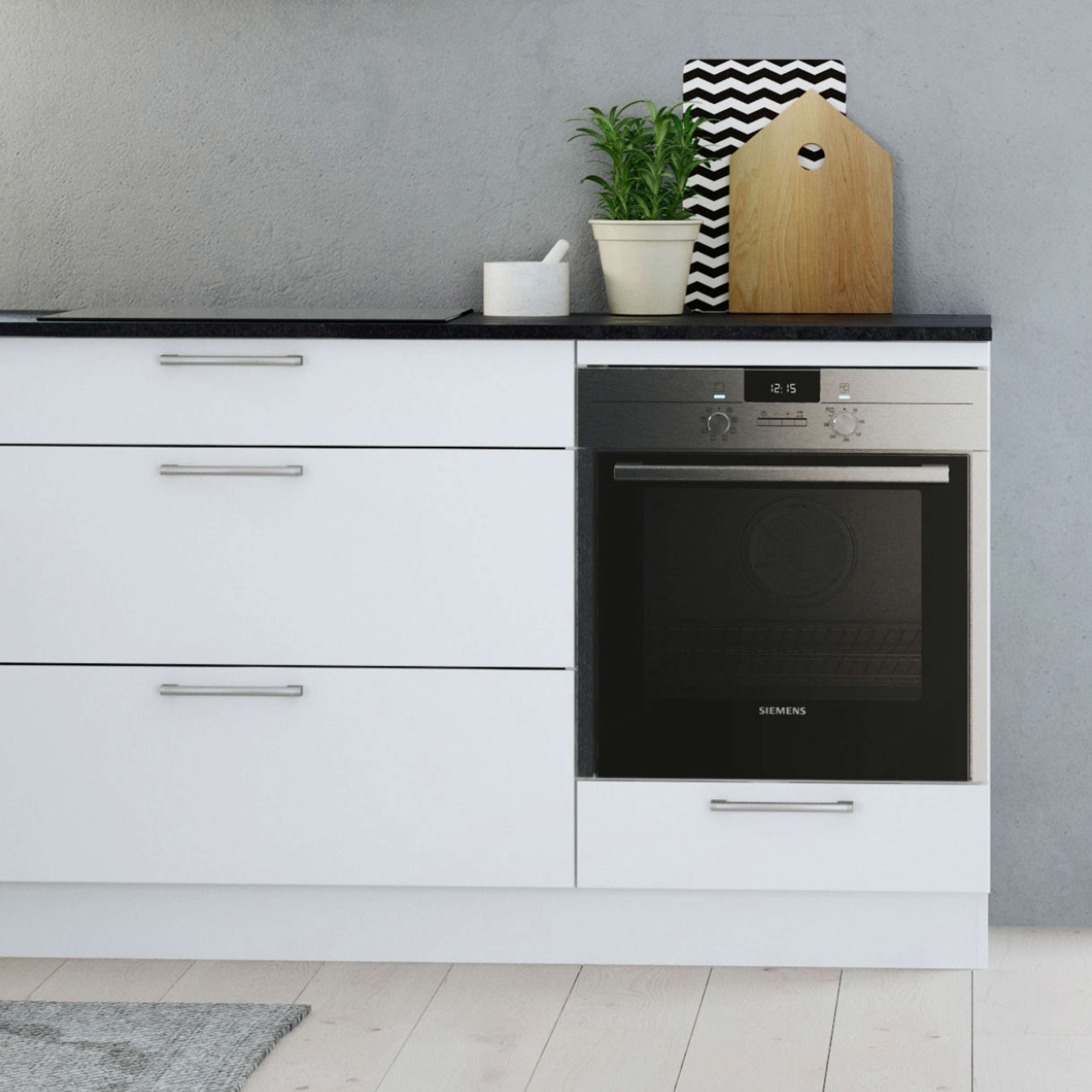 MILK hvite moderne kjøkkenskap med elegant svart benkeplate, minimalistisk design som tilbyr et rent, moderne utseende for organiserte matlagingsplasser.