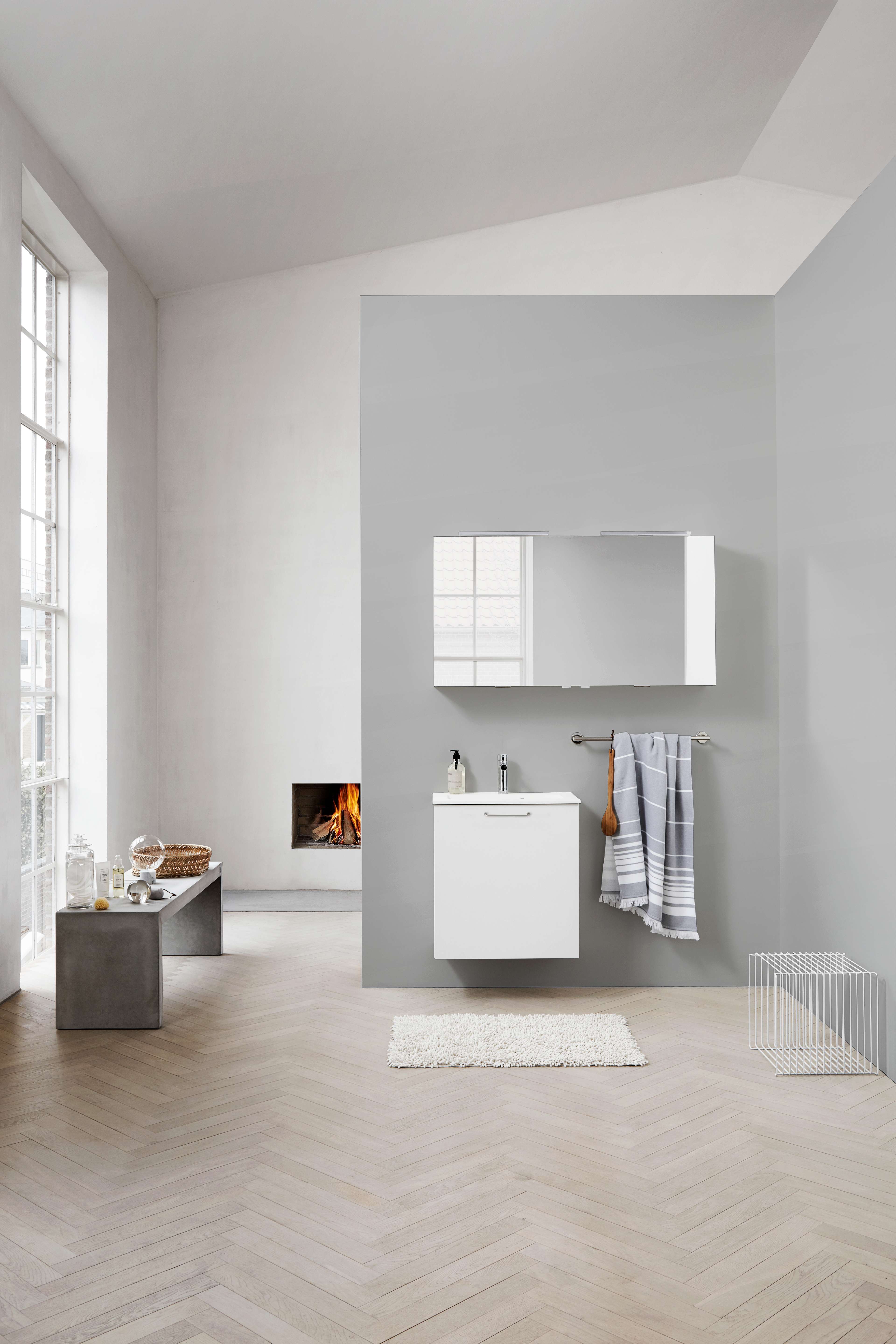 VEDA white bathroom vanity in minimalist design, featuring sleek storage and contemporary styling, enhancing a modern Bath series aesthetic.