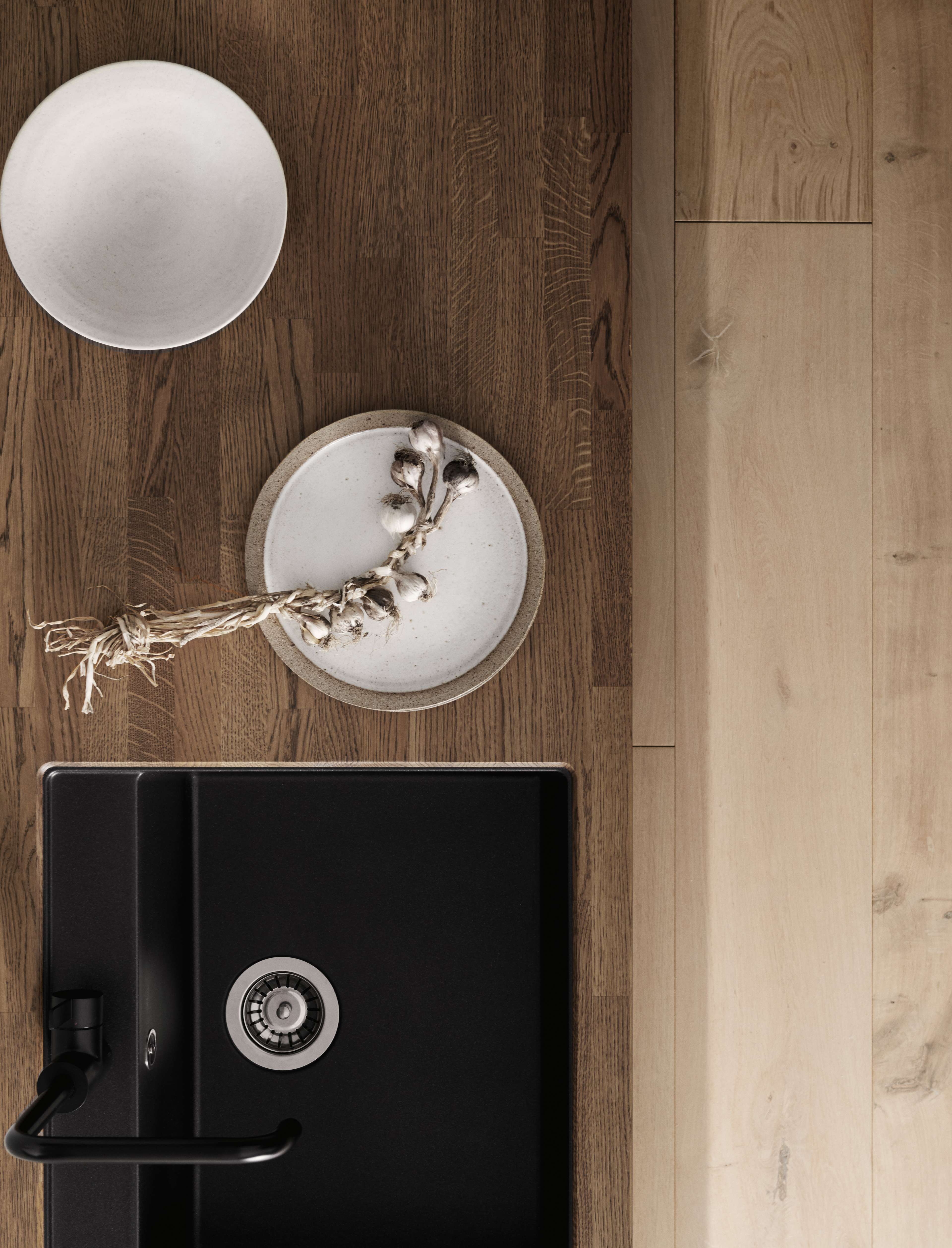 Wooden worktop with a black sink