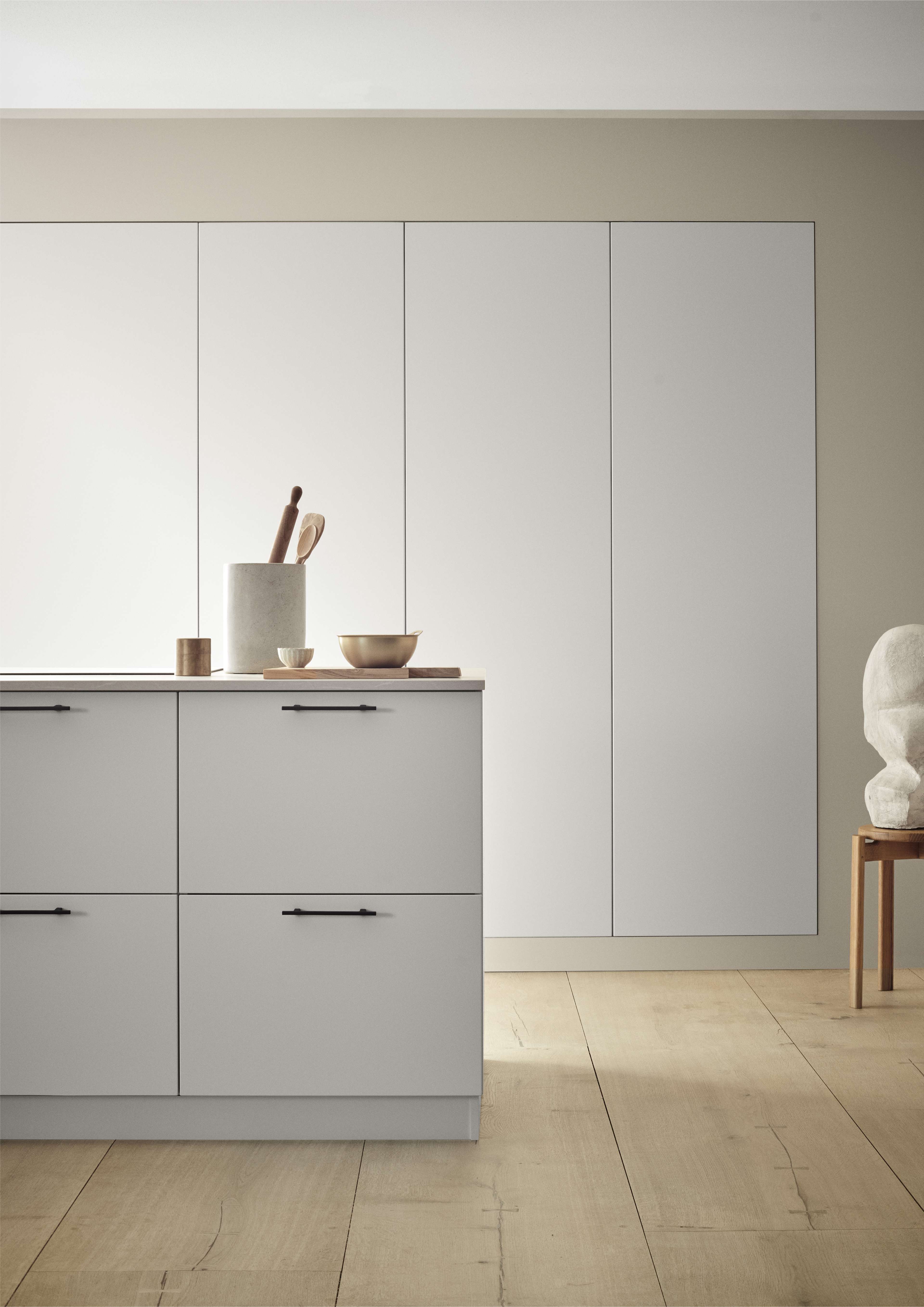 VEDA white minimalist kitchen with sleek cabinetry and modern design, featuring smooth panels and understated elegance for a contemporary home.