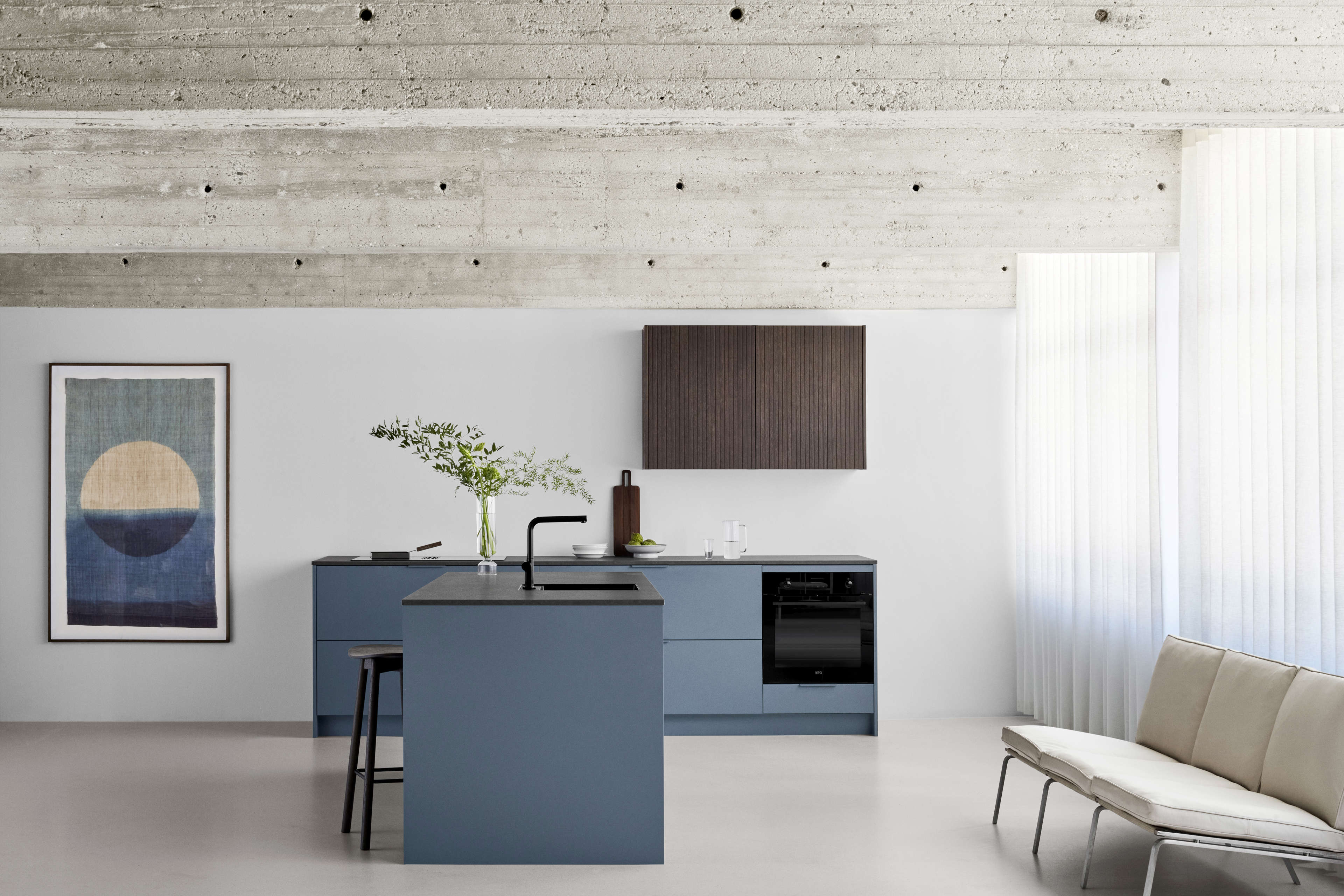 BORDO blue kitchen with modern minimalist design, featuring sleek cabinetry and integrated appliances, creating a stylish and functional space.
