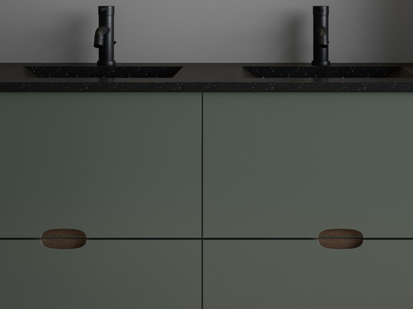 Vanité de bain verte OMBRA avec deux lavabos, présentant des lignes épurées et des poignées modernes, parfaite pour une configuration de salle de bain minimaliste et élégante.