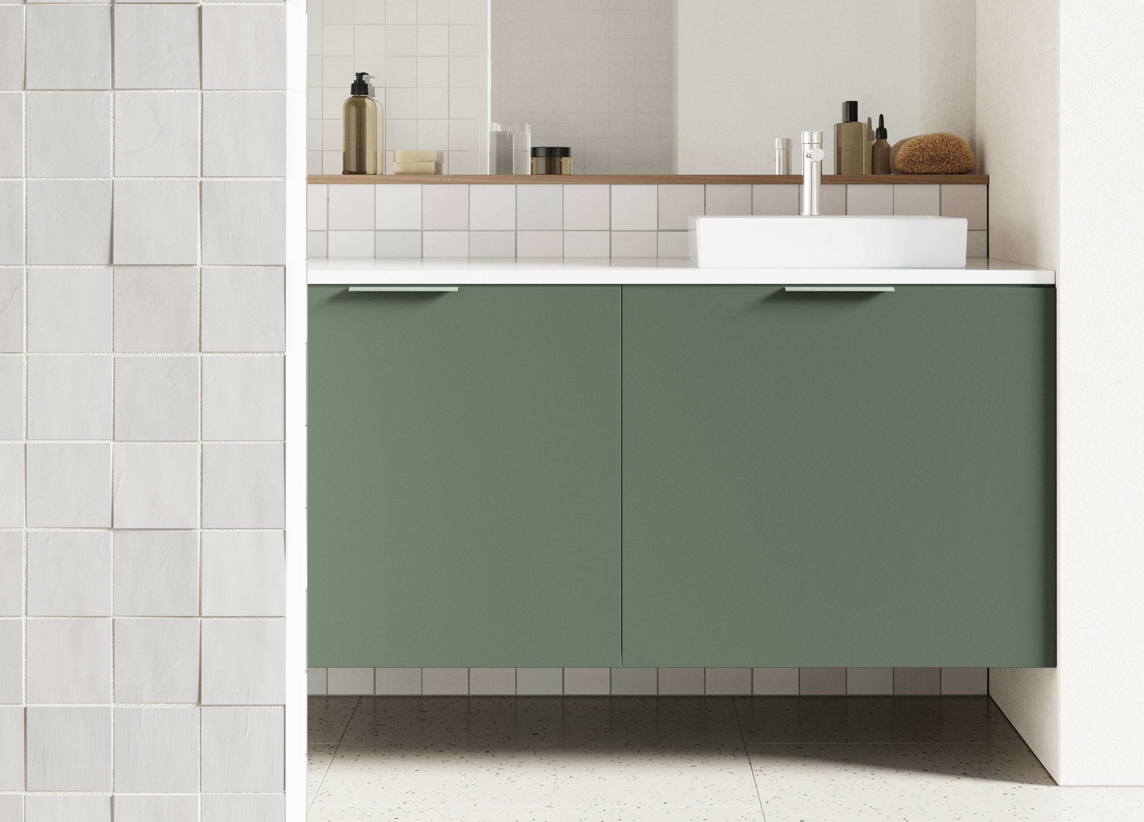 VEDA green bathroom cabinet in Bath series with minimalist design and sleek white countertop, enhancing modern bathroom aesthetics with elegance.