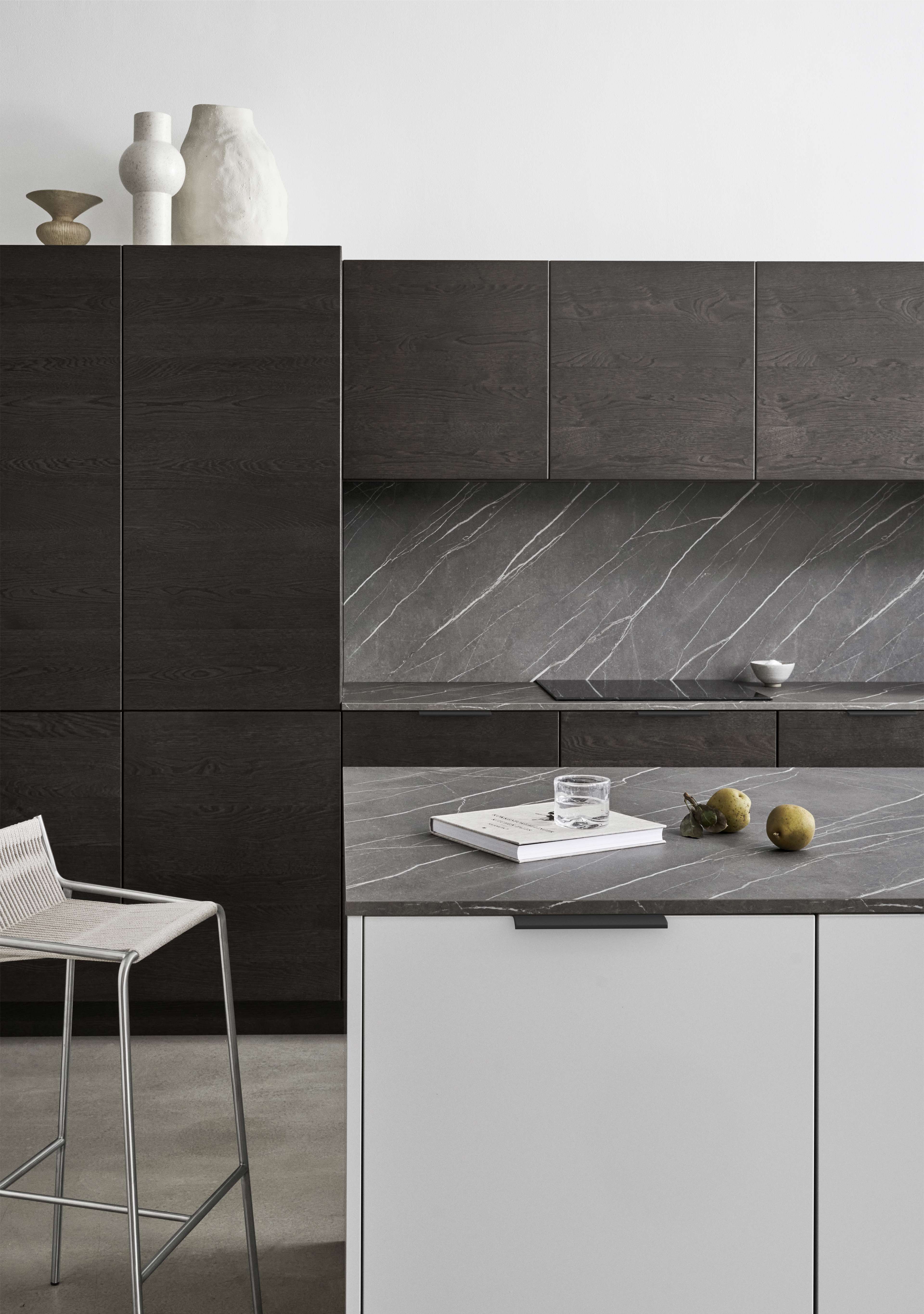 VEDA Touch pure grey dark oak kitchen cabinets with sleek, modern lines, offering a refined, elegant design with integrated storage solutions.