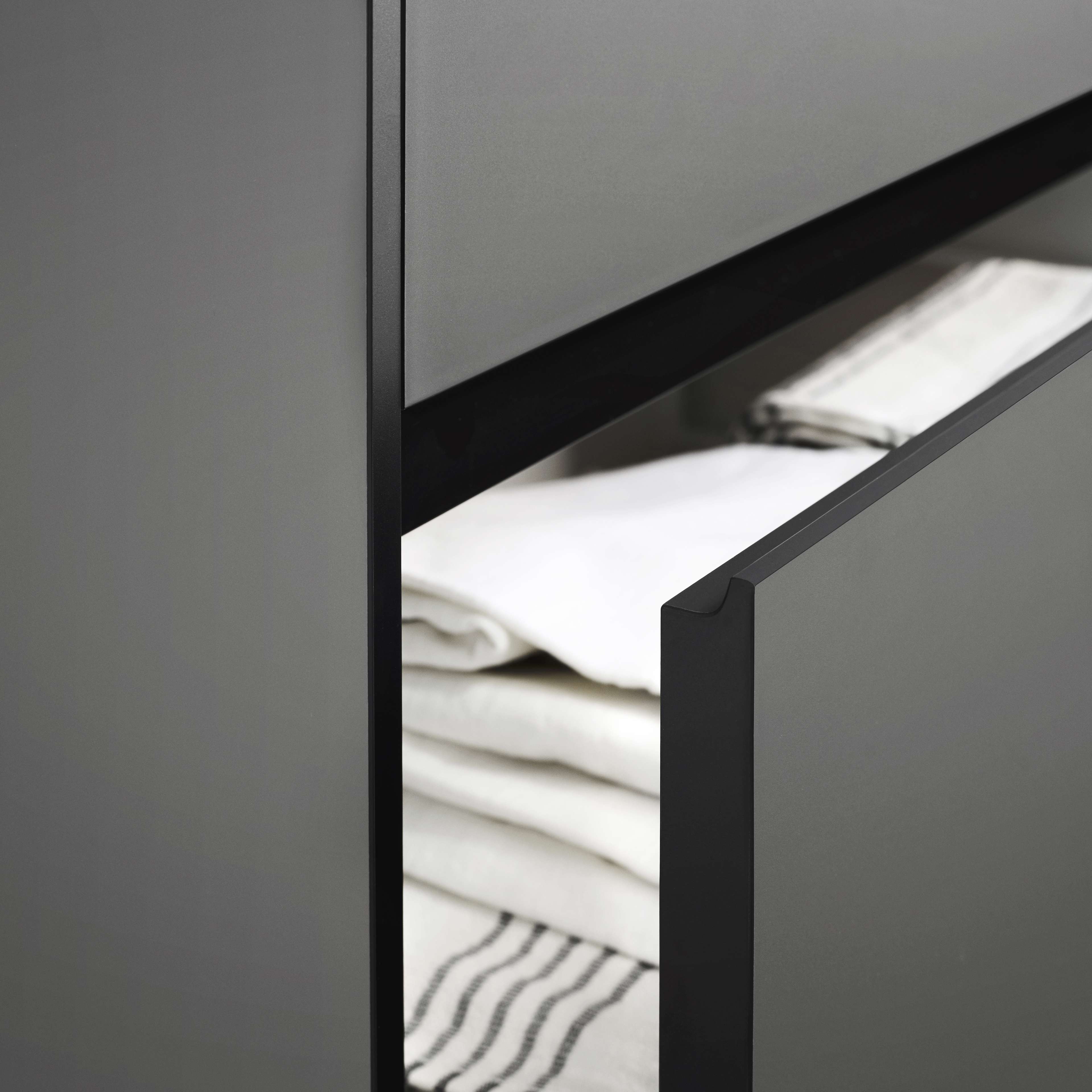 PRATO gray bathroom cabinet with sleek matte finish and minimalist handleless design, offering ample storage space for a modern, organized bath.