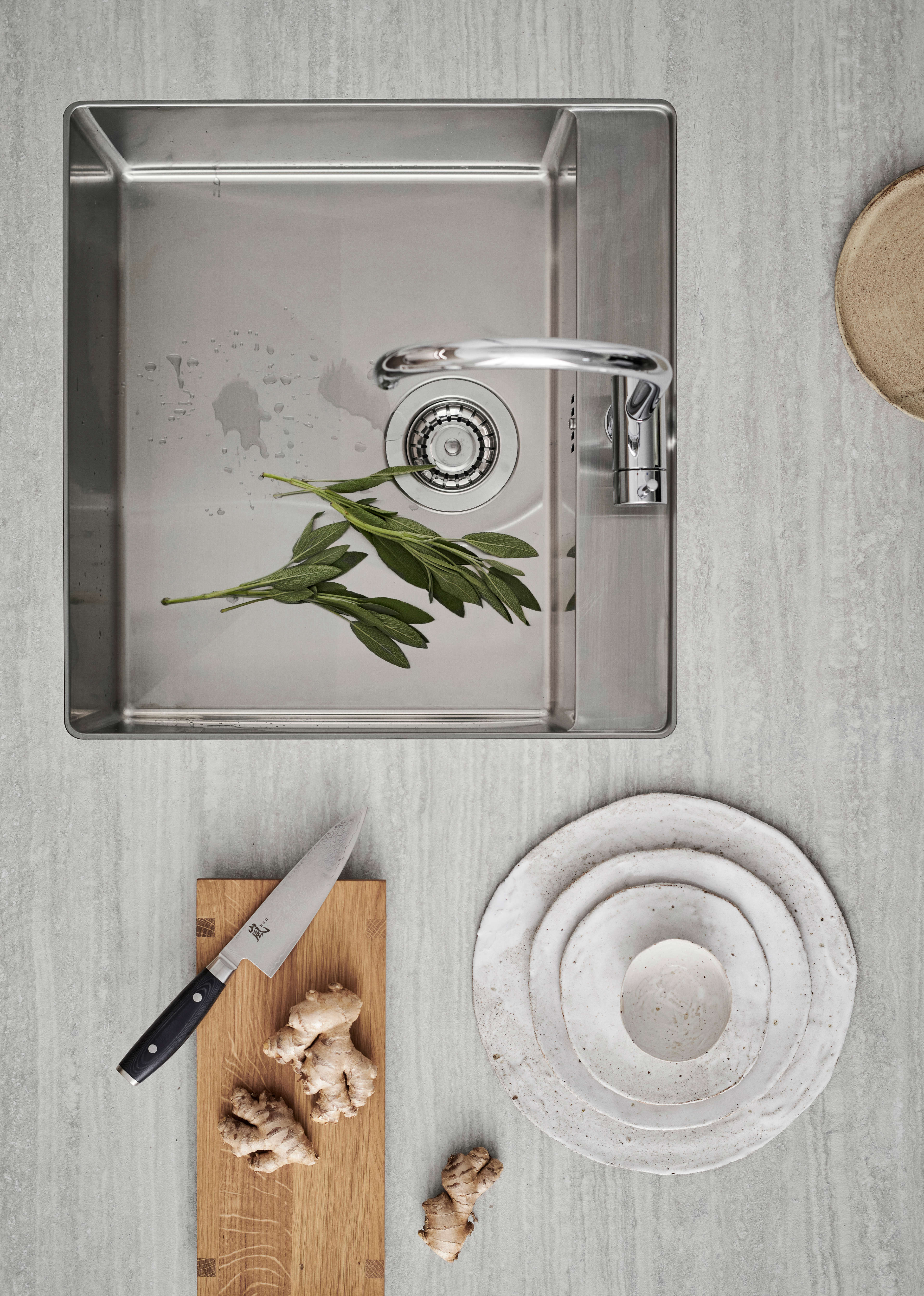 NOLIAM arizona beige kitchen sink with a brushed steel finish, offering a modern and minimalist design for a functional and stylish kitchen space.