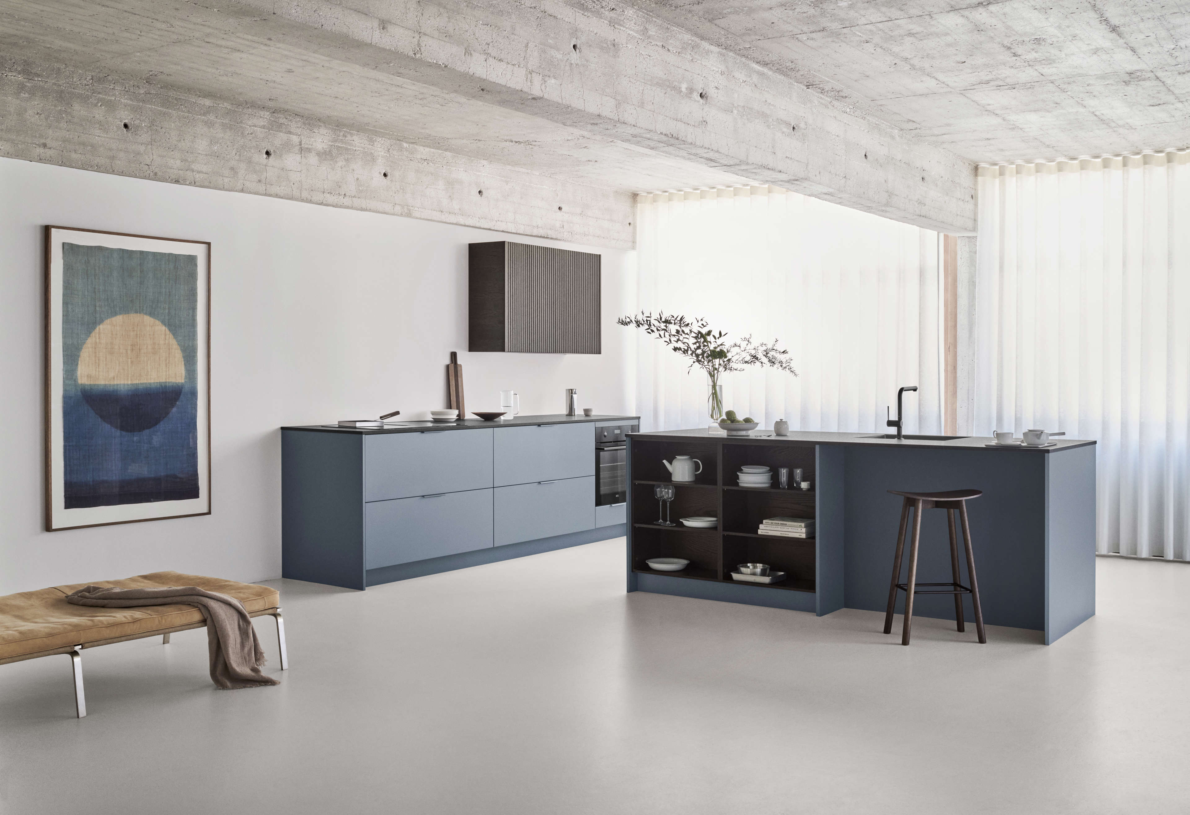 BORDO blue kitchen with sleek minimalistic cabinets and spacious island, combines contemporary elegance with functional open shelving.